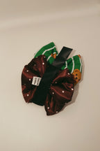 Christmas Teddy coordinating pet pillow bows and accessories from Pawrawrdise