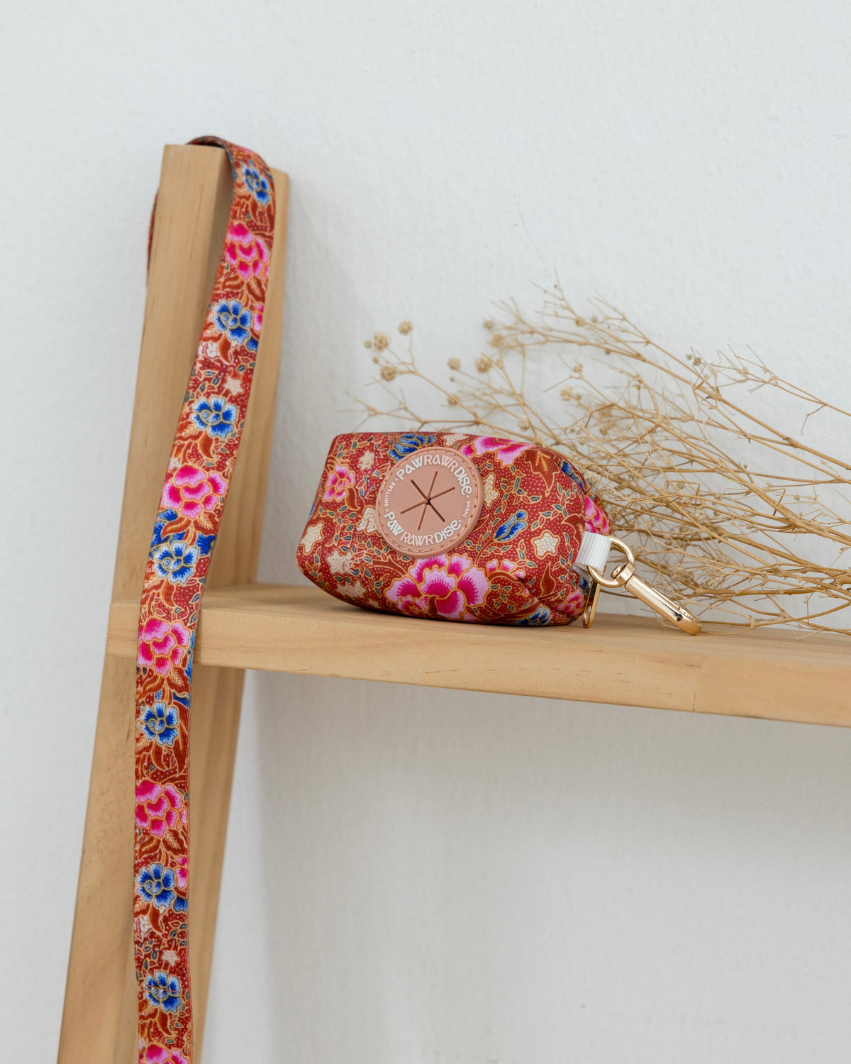 Scarlet Batik Poop Bag Holder – dog poop bag holder in a red batik-inspired print